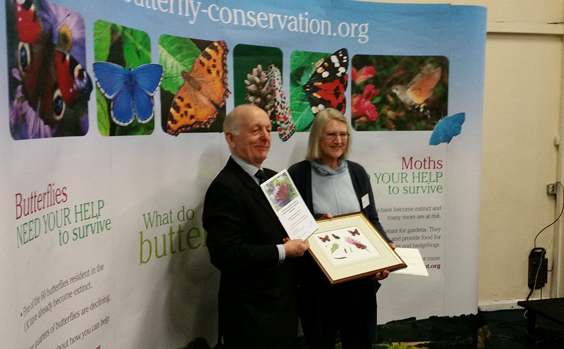 Peter Titley presents the award to Margaret Vickery at Butterfly Conservation's National AGM held in Stoneleigh, Warwickshire - November 2014.